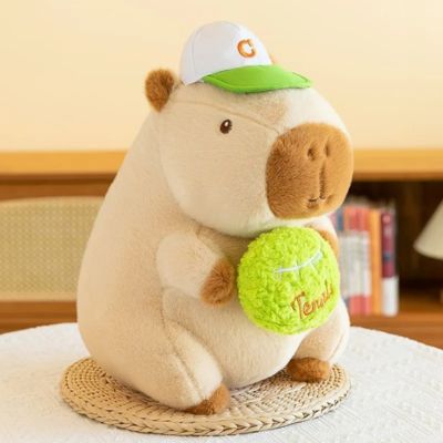 Peluche-Capybara-beige-avec-une-balle