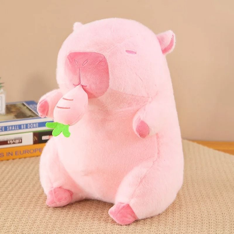 Peluche-capybara-rose-avec-carotte