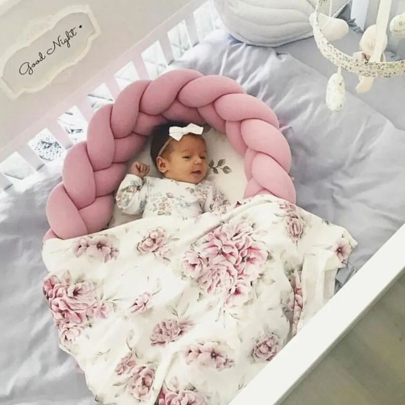 Reducteur-de-lit-bebe-sommeil-rose