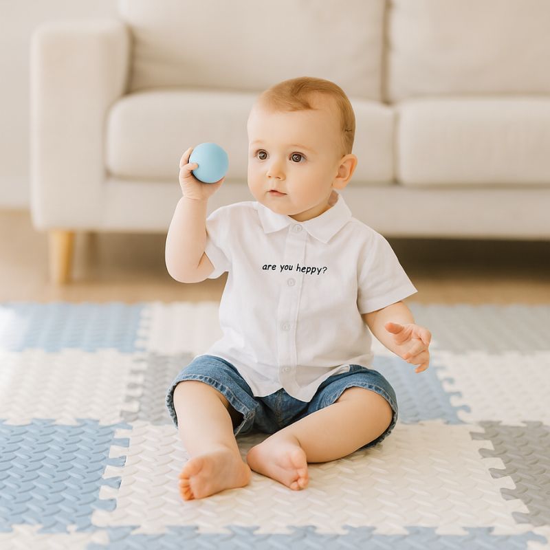 Tapis_d_eveil_pliable_carreaux_bleu_et_grisb_blanc