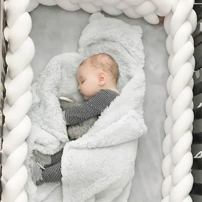 Tour-de-lit-tresse-blanc-pour-bebe