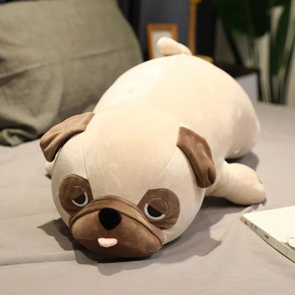 Peluche chien allongé