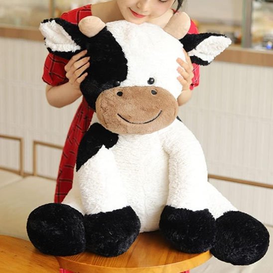 Peluche vache blanche